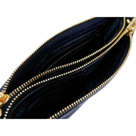 Prada Tessuto Nylon Blue Zip Calf Leather Cross Body Bag available at Queen Bee of Beverly Hills