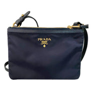 Prada Tessuto Nylon Blue Zip Calf Leather Cross Body Bag available at Queen Bee of Beverly Hills
