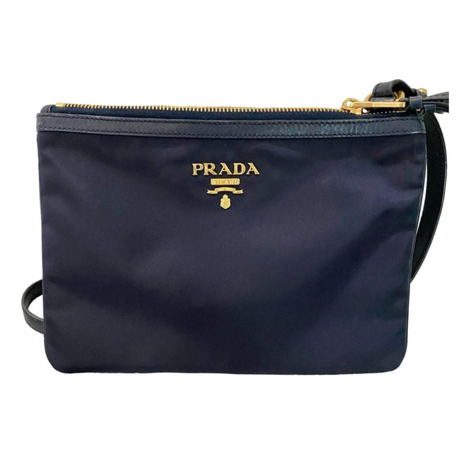 Prada Tessuto Nylon Blue Zip Calf Leather Cross Body Bag available at Queen Bee of Beverly Hills