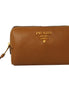 Prada Vitello Daino Cannella Brown Leather Cosmetic Pouch Clutch Bag available at Queen Bee of Beverly Hills