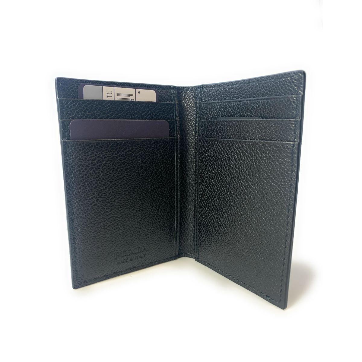 Prada Vitello Grain Black Leather Triangle Logo Vertical Bifold Wallet available at Queen Bee of Beverly Hills
