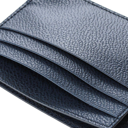 Prada Vitello Micro Grain Navy Triangle Logo Cardholder Wallet available at Queen Bee of Beverly Hills