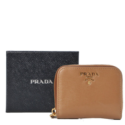 Prada Vitello Move Cipria Beige Leather Zip Around available at Queen Bee of Beverly Hills