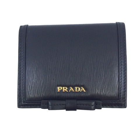 Prada Vitello Move Leather Bi Fold Flap Bow Front Snap Close Wallet 1MV204 at_Queen_Bee_of_Beverly_Hills
