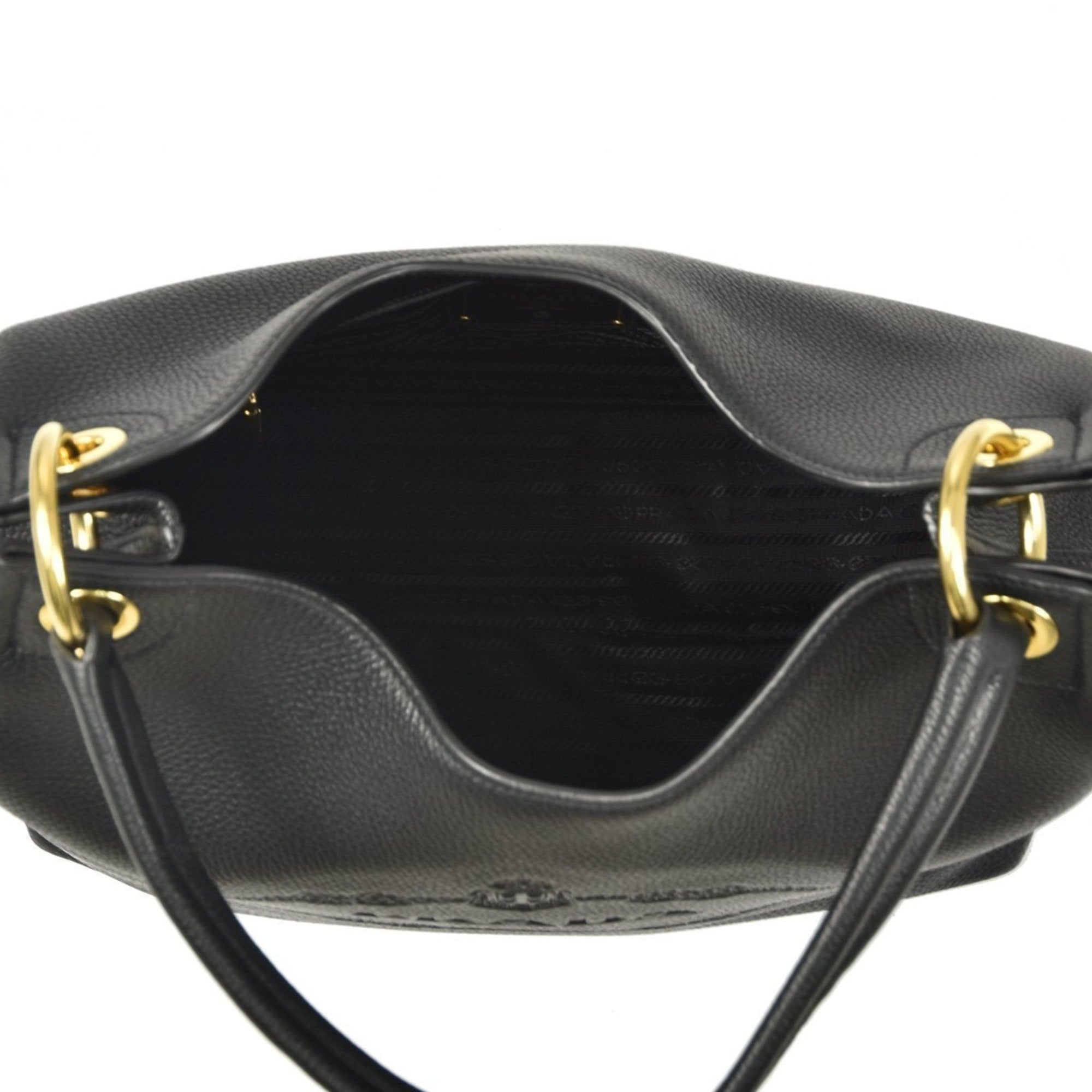 Prada Vitello Phenix Black Leather Embossed Logo Hobo Tote Bag available at Queen Bee of Beverly Hills