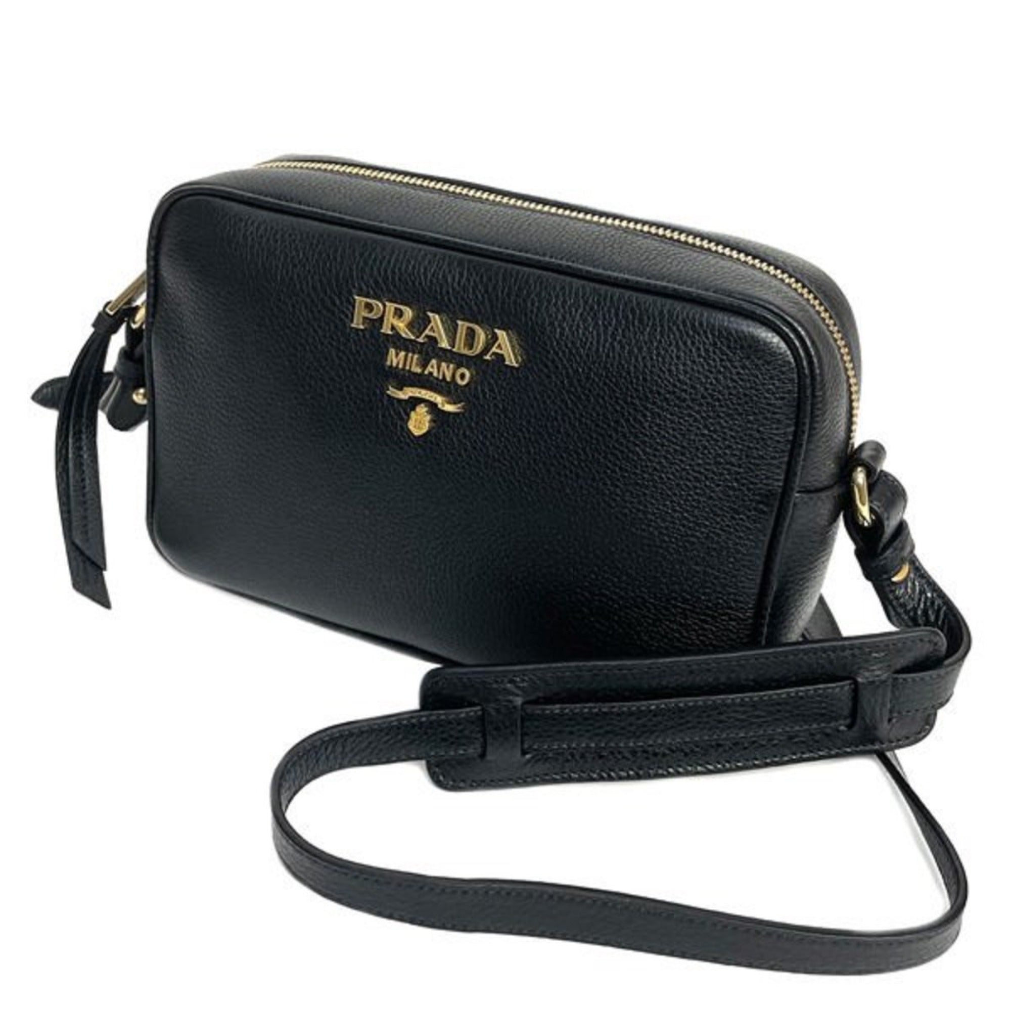 Prada Vitello Phenix Black Leather Gold Logo Camera Crossbody Bag available at Queen Bee of Beverly Hills