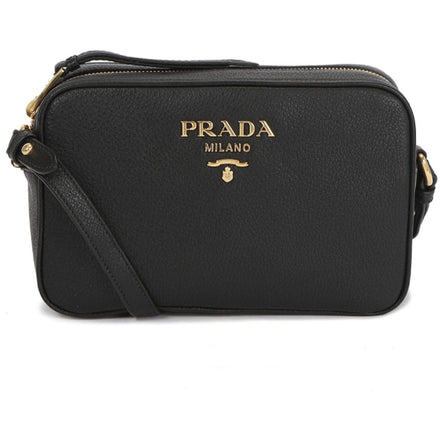 Prada Vitello Phenix Black Leather Gold Logo Camera Crossbody Bag available at Queen Bee of Beverly Hills