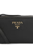 Prada Vitello Phenix Black Leather Gold Logo Camera Crossbody Bag available at Queen Bee of Beverly Hills