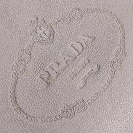 Prada Vitello Phenix Grey Leather Embossed Logo Hobo Tote Bag available at Queen Bee of Beverly Hills