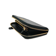 Prada Women's Black Saffiano Cuir Full Zip Wallet available at Queen Bee of Beverly Hills