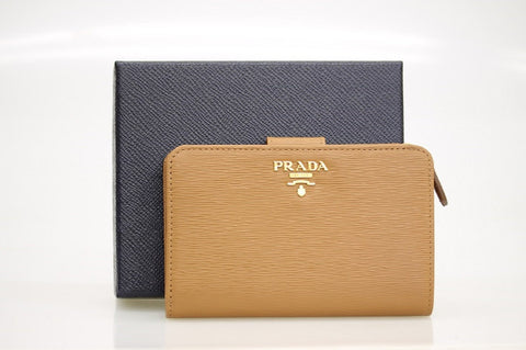 Prada Women's Vitello Move Zip Wallet Caramel With Snap Closure 1M1225 at_Queen_Bee_of_Beverly_Hills
