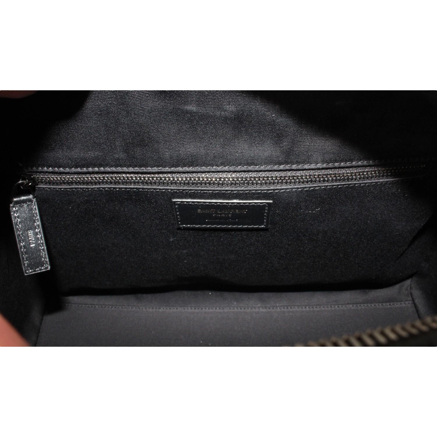 Saint Laurent 12 Hour Calfskin Leather Pony Hair Duffle Bag available at Queen Bee of Beverly Hills