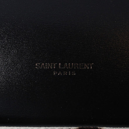Saint Laurent 12 Hour Calfskin Leather Pony Hair Duffle Bag available at Queen Bee of Beverly Hills