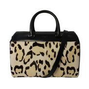 Saint Laurent 12 Hour Calfskin Leather Pony Hair Duffle Bag available at Queen Bee of Beverly Hills