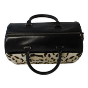 Saint Laurent 12 Hour Calfskin Leather Pony Hair Duffle Bag available at Queen Bee of Beverly Hills