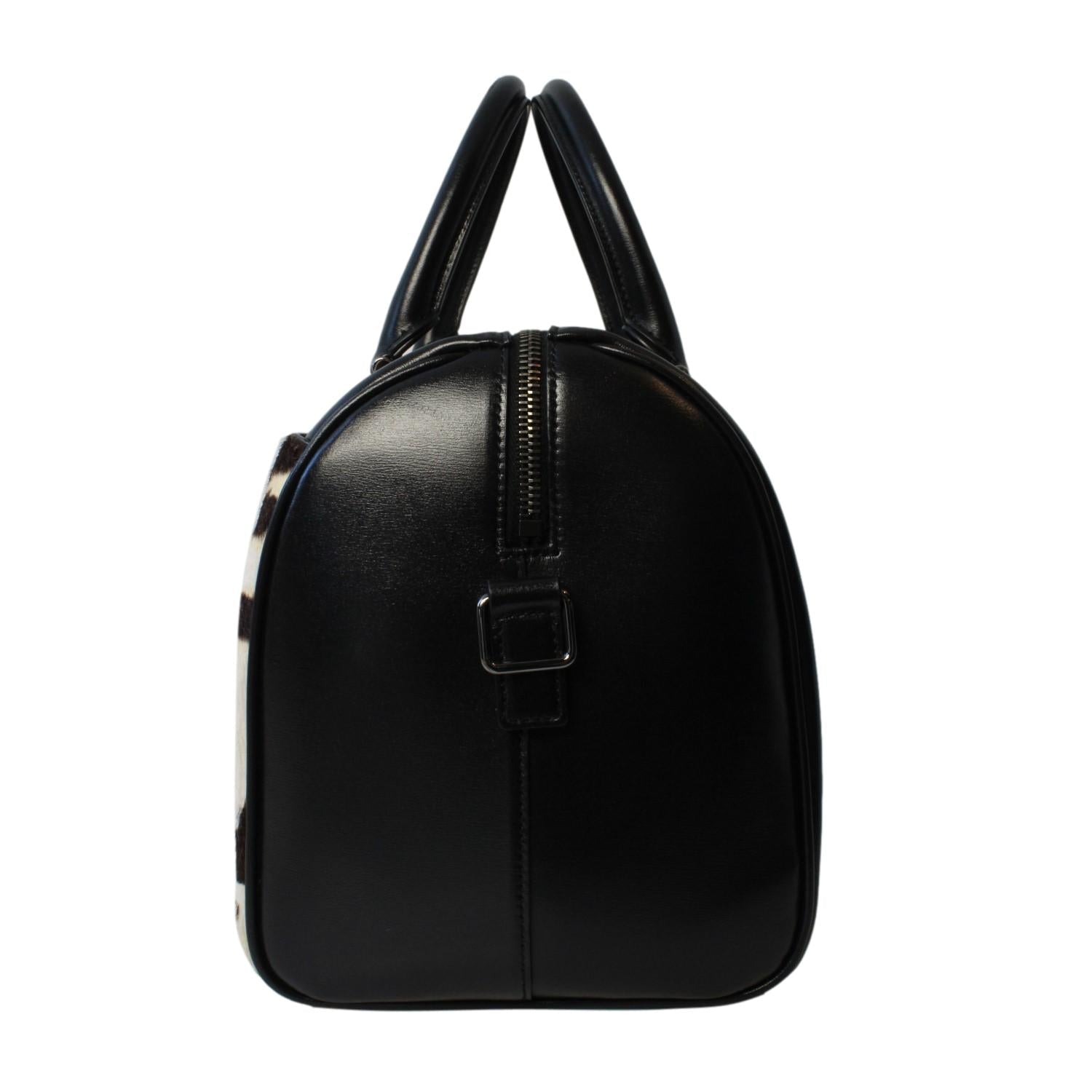 Saint Laurent 12 Hour Calfskin Leather Pony Hair Duffle Bag available at Queen Bee of Beverly Hills