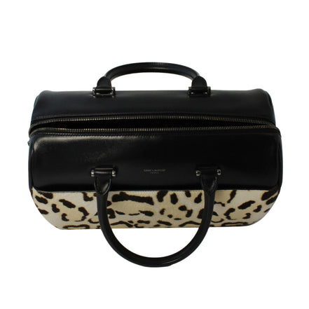 Saint Laurent 12 Hour Calfskin Leather Pony Hair Duffle Bag available at Queen Bee of Beverly Hills