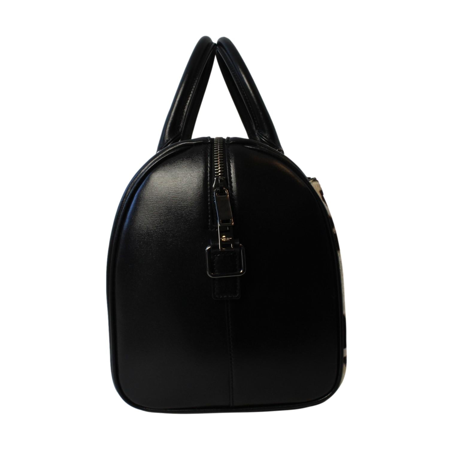 Saint Laurent 12 Hour Calfskin Leather Pony Hair Duffle Bag available at Queen Bee of Beverly Hills