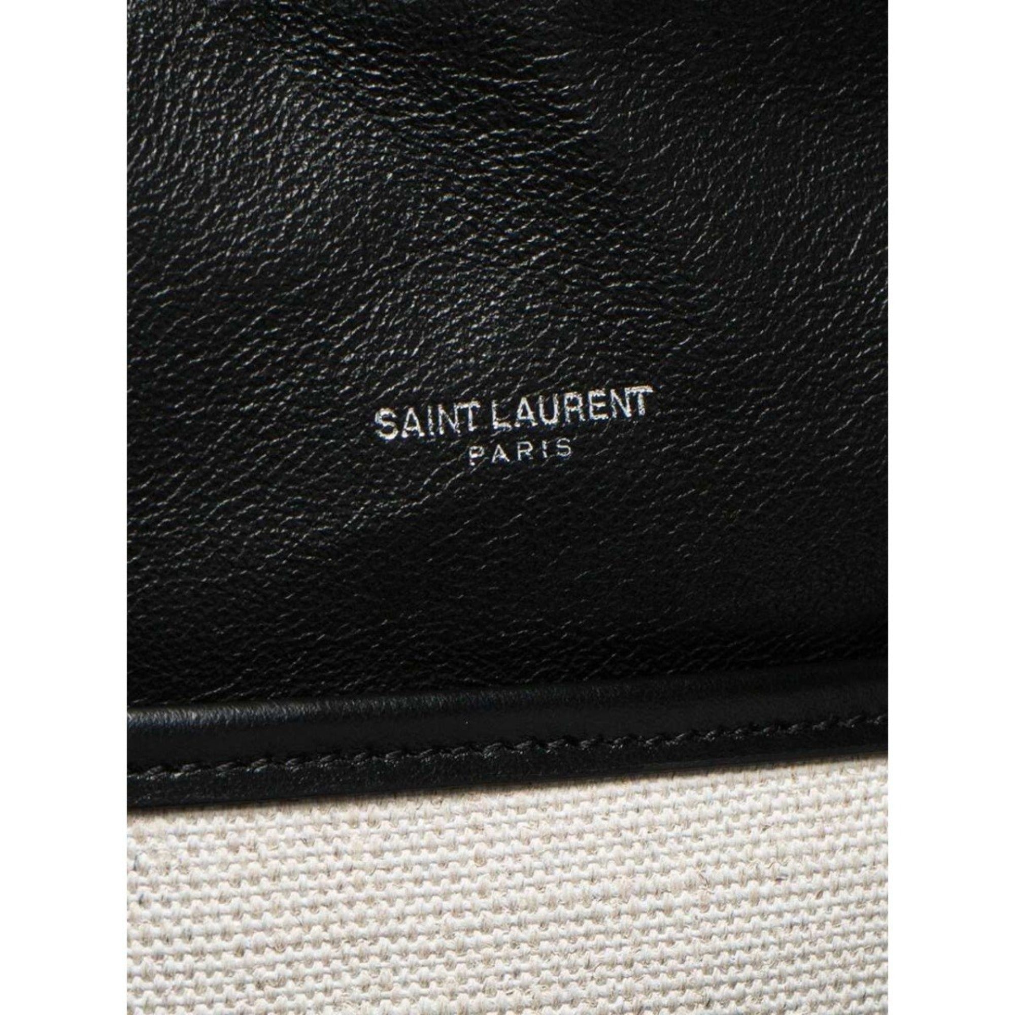 Saint Laurent Teddy White Coated Linen Drawstring Bucket Bag available at Queen Bee of Beverly Hills