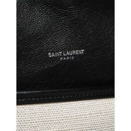 Saint Laurent Teddy White Coated Linen Drawstring Bucket Bag available at Queen Bee of Beverly Hills